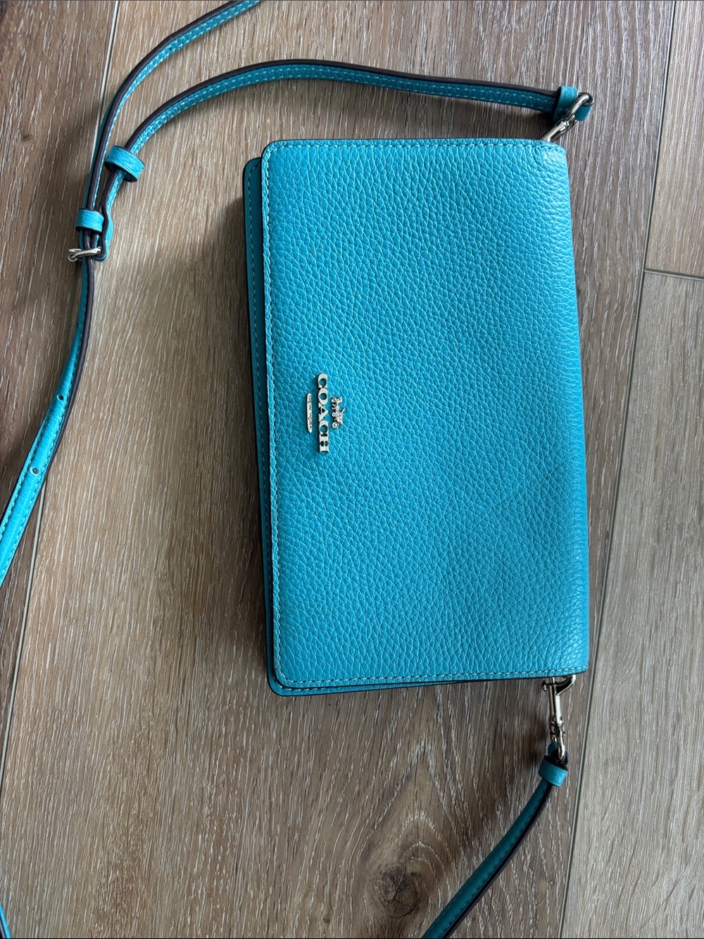 Bright blue coach purse
